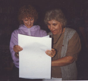 Showing my newly printed evolution chart to Polly Friedman in 1983